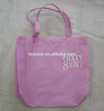 Pink carrier non-woven shopping bag button snap bag with handles