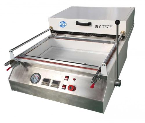 small ABS vacuum thermoforming machine