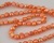 wholesale 9.5-10.5mm tomato colored freshwater nugget pearl beads loose strands