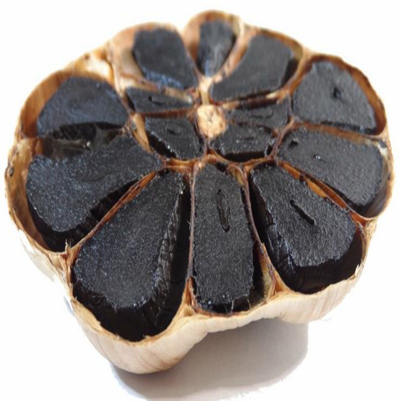 Elegant wrapped whole black garlic