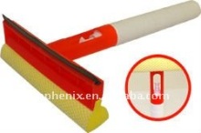 Window cleaning brush with spray