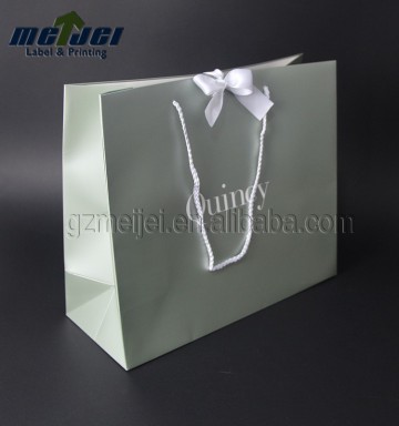 luxury green gift paper shopping paper bag with a knot