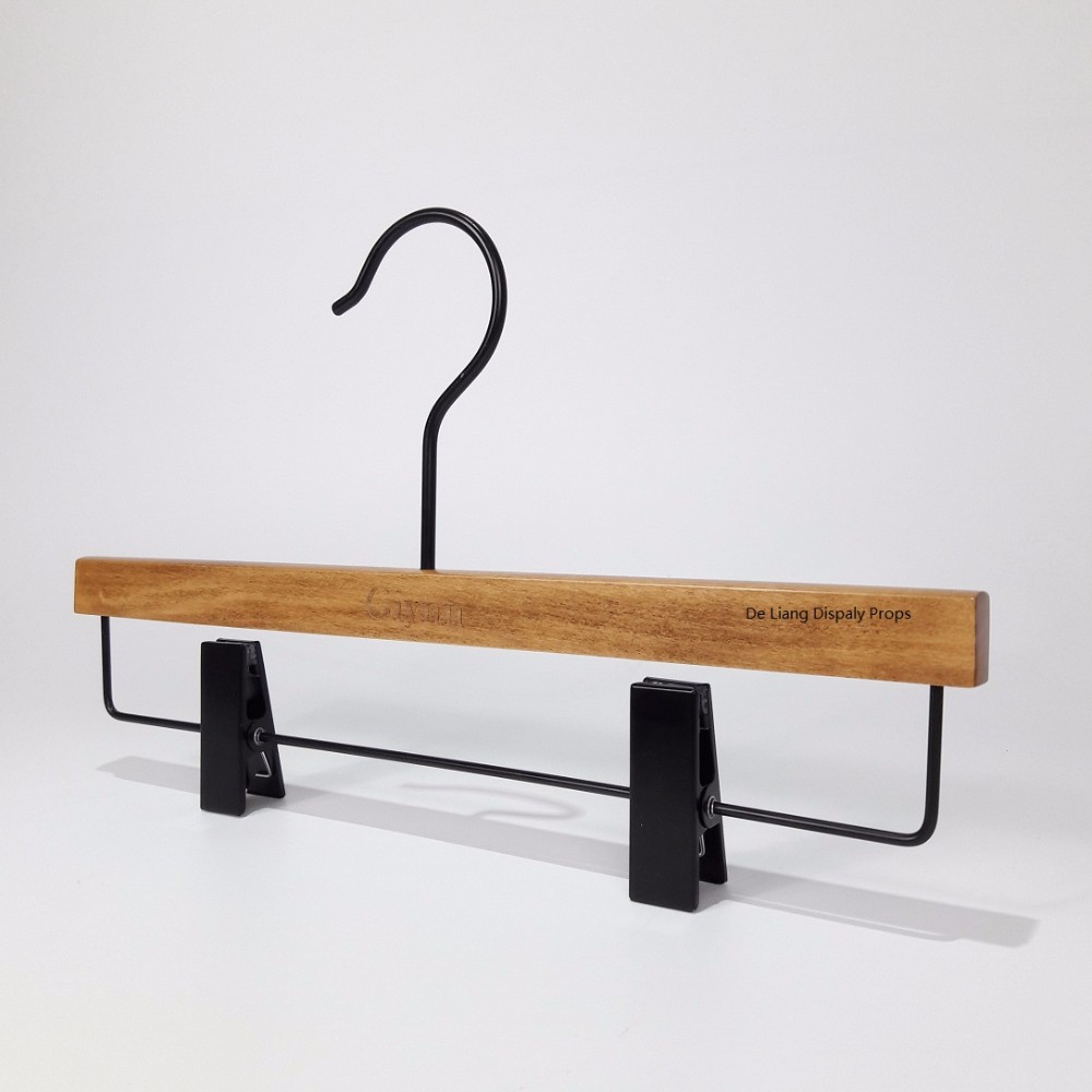 DL639 Durable Fashionable custom branded pant hanger Dutch wooden hanger with black hook display wooden hanger