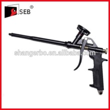 Adhesive foam dispensing guns