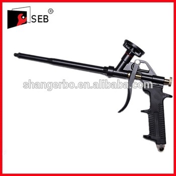 Adhesive foam dispensing guns