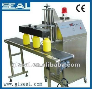 automatic water cooled induction cap sealing systesms.