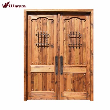Double leaf fire rated knotty timber door with iron grid window