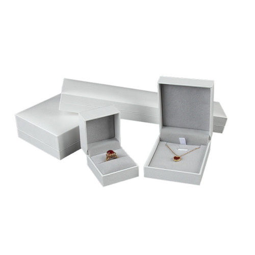 Boîte de bijoux de charnière en cuir blanc de luxe