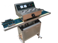 Toothpaste electromagnetic induction sealing machine