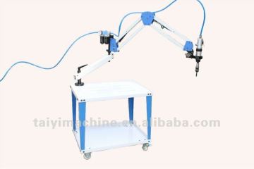 articulated arm air tapping machine