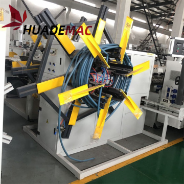 Plastic pipe coil winding machine