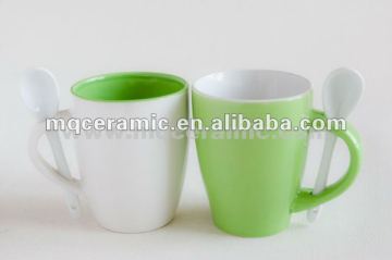 Ceramic mug with spoon
