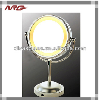 Lighted fogless shower mirror