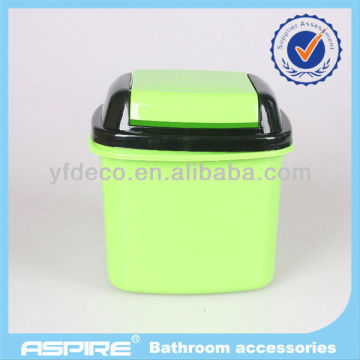 Solid green plastic dust bin