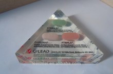 Custom made lucite paperweight with pills replica inside