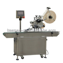 Automatic top-side labeling machine