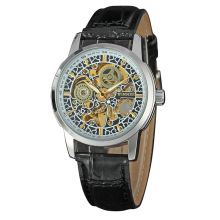 vintage mechanical watch bezel insert with visible mechanism