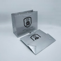 Zilveren kleuren papieren zakken handtas afdrukken voor kleding
