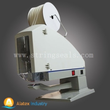 Plastic Staple Roll Machine (Avery Dennison ST9000)