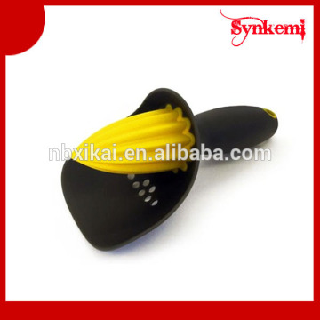 Plastic hand lemon juicer