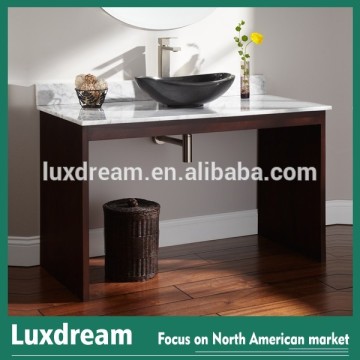 ADA hotel bathroom vanity furniture with black glass vessel basin