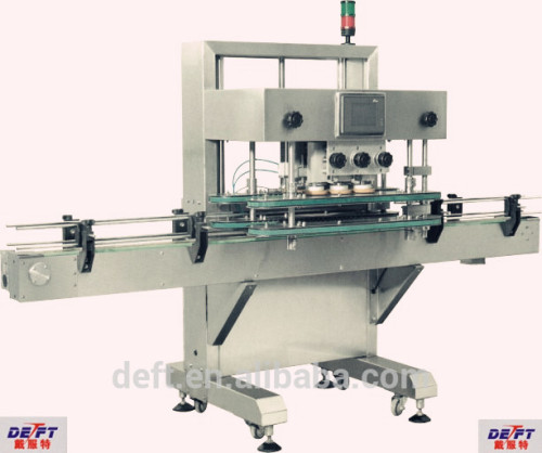 Automatic wine bottle screw cap machine