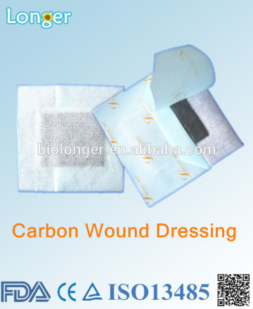 sterile medical dressing with activated carbon