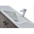 Solid surface one time form cabinet basins