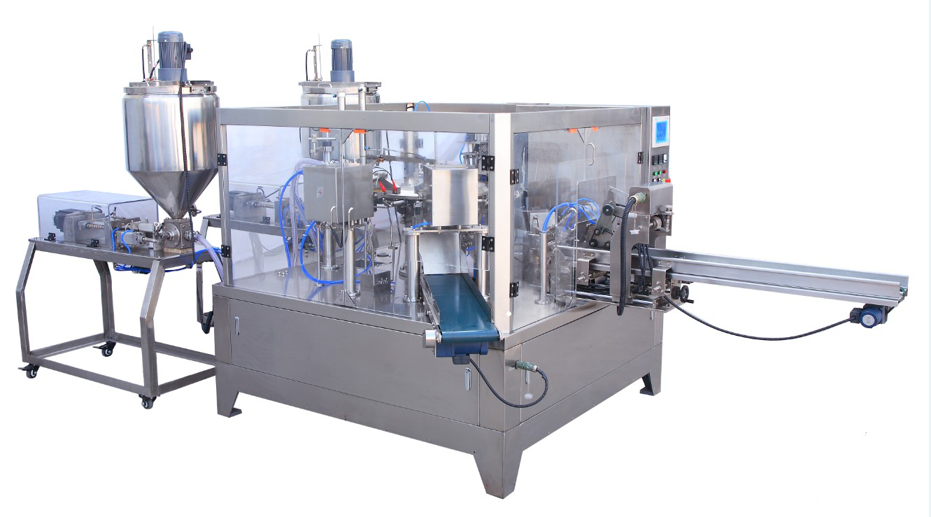 rotary filling and sealing machine