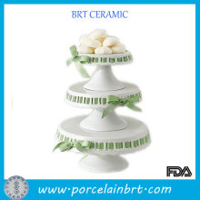 Wedding 3 tier ceramic cake stand with ribbon decorating cake