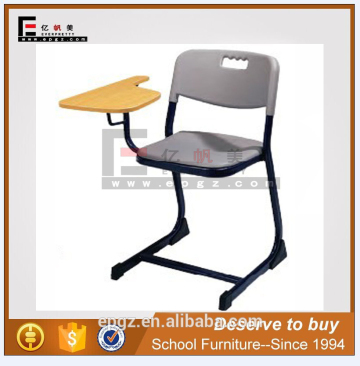 student chair with writing pad writing board