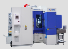 Gear hobbing machine with chamfering unit