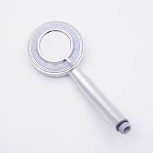 Shower head with propeller propeller driven shower head