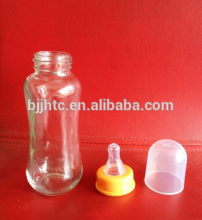 small fresh milk glass bottle with cap