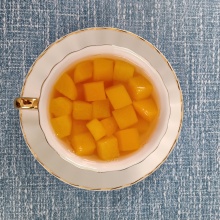 Canned Yellow Peach in 4oz Plastic Cup