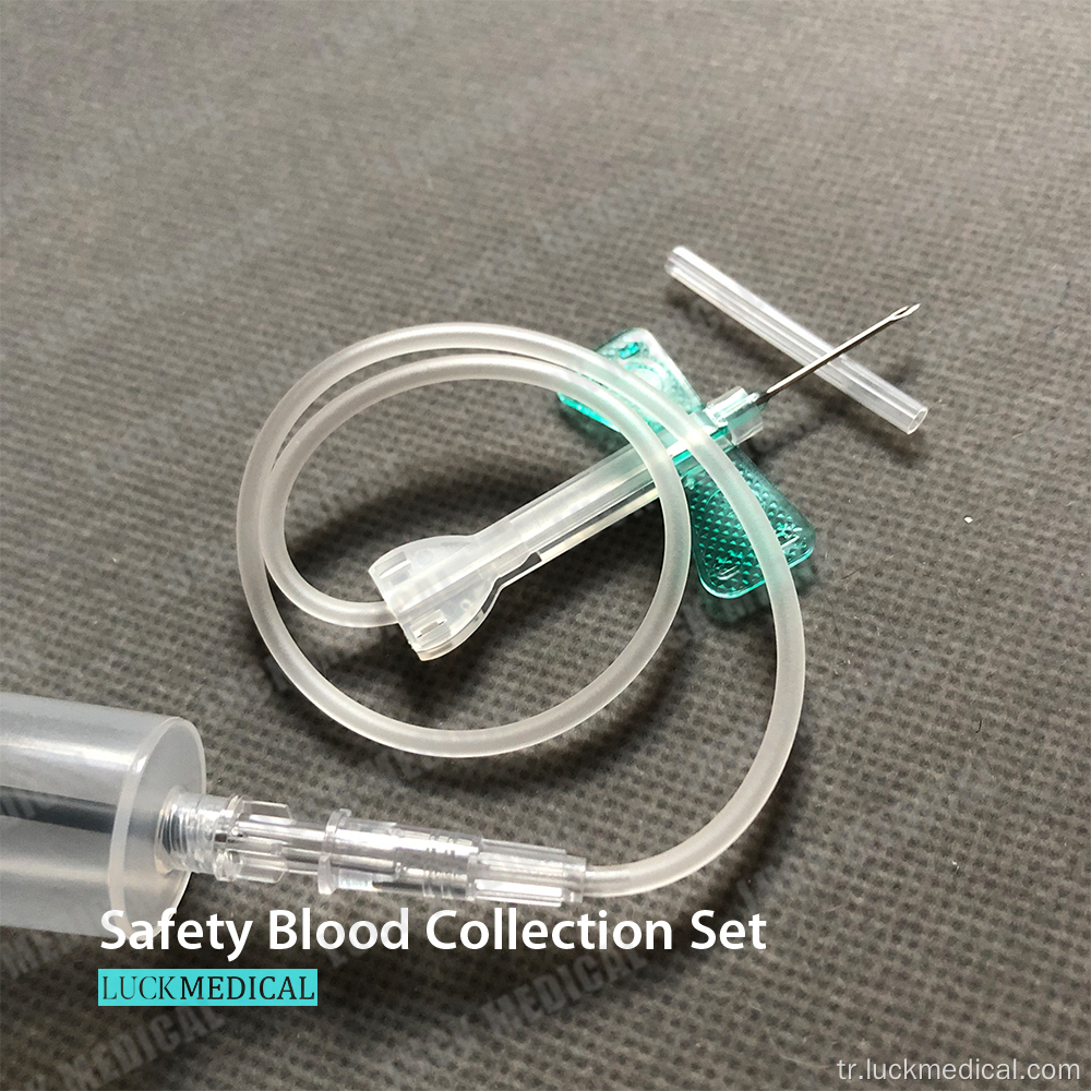 Önceden bağlı tutucu ile güvenlik kan toplama iğnesi