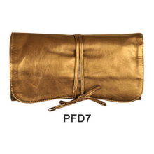 Golden satin makeup folder with tie