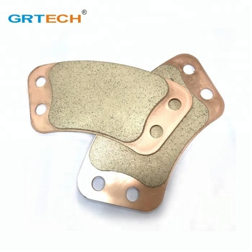 High friction sintered brass clutch button