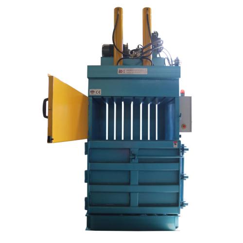 Vertical hydraulic baler machine