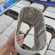 Plastic Shell Featuring Fabric Enclosure Design