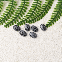 Snowfake Obsidian Oval falt back Cabochon Cut