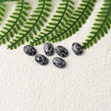 Snowfake Obsidian Oval falt back Cabochon Cut