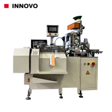 Automatic tags eyelet and threading machine