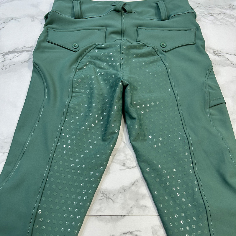 green equestrian leggings