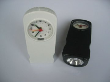 Multi functional torch with alarm clock