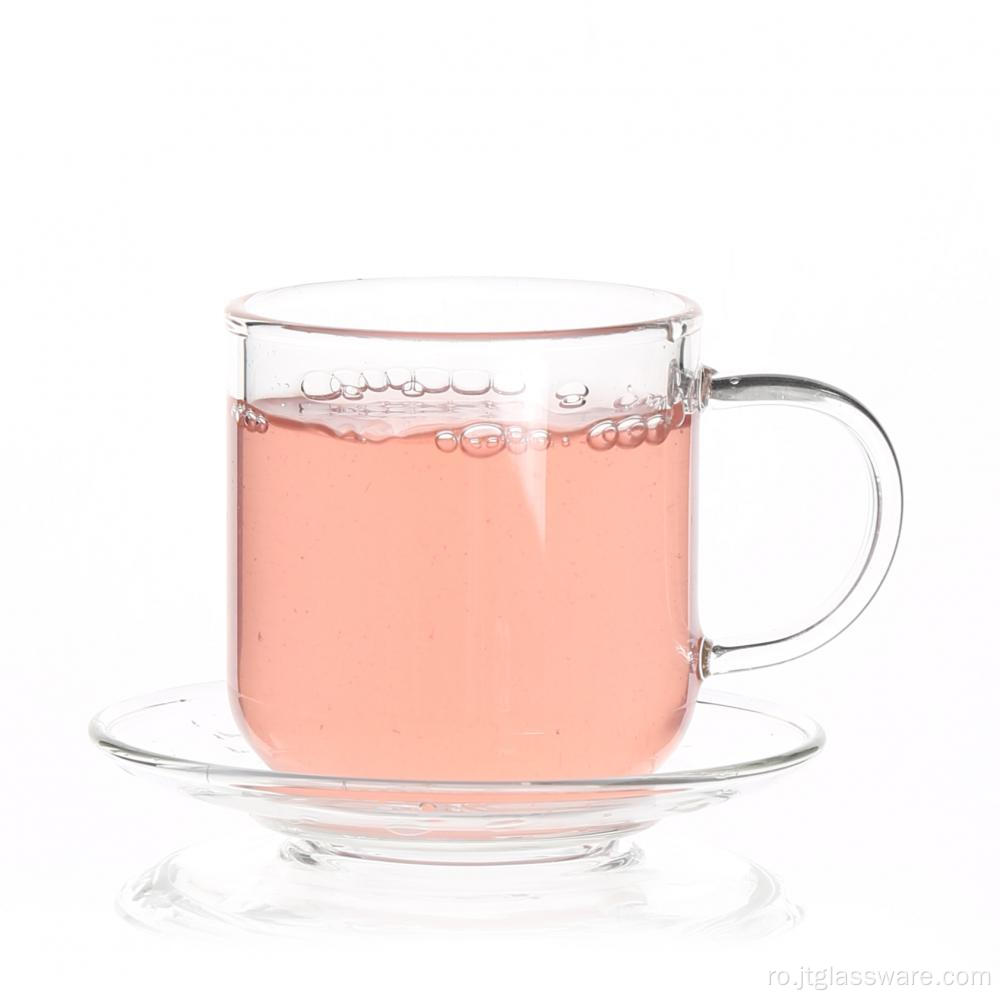 ceașcă de ceai mică de sticlă cu un singur perete cu farfurie