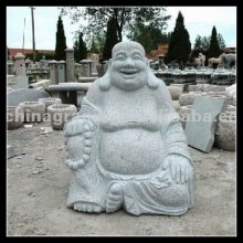 smiling stone buddha sculpture