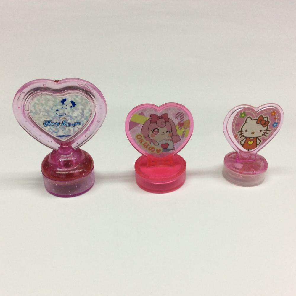 Plastic cartoon heart-shaped handle stamp