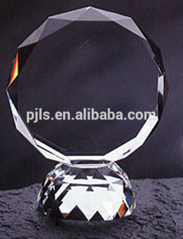 round shape clear glass award with word engraved