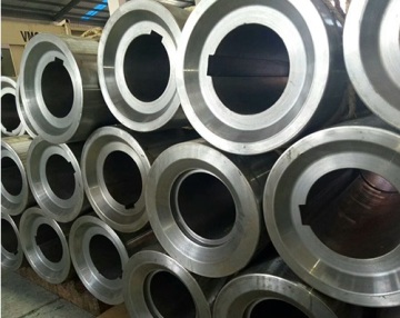 Cast bush and sleeve for sink rolls